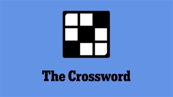 Marshy area Crossword Clue